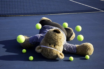 Tennis Player with Bouncing Balls