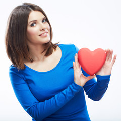 Smiling young woman hold red heart, Valentine day symbol. Girl