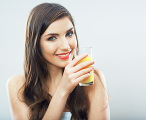 Female model hold orange juice glass isolated .
