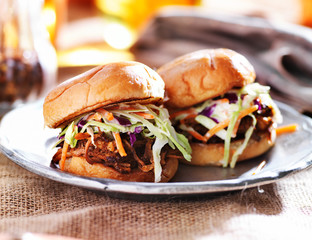 pulled pork sandwiches with bbq sauce and slaw