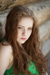 Portrait of the beautiful red-haired girl