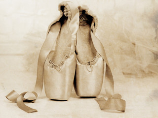 Ballet pointe shoes on floor