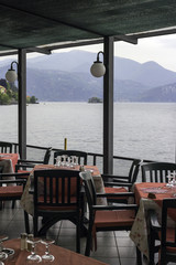 Restaurant dehor over the lake Maggiore color image