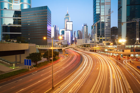 Road light trails on streetscape buildings in HongKong