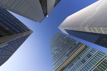 Fototapeta na wymiar 高層ビル街を見上げるイメージ