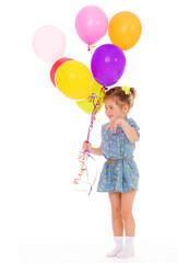Fototapeta na wymiar Charming girl with balloons.