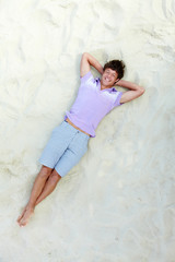 Lad on sand