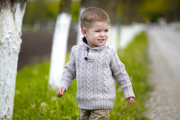 Trendy 2 years old baby boy posing