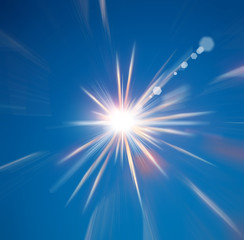 Fototapeta premium flash of light on a dark blue sky