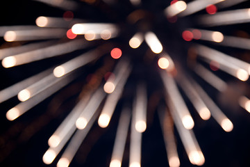 defocused image of fireworks, background with glares, holiday ba
