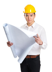 Construction worker holding with blue print