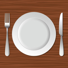 Blank Plate, Fork and Knife on Old Wooden Table