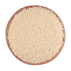 Sesame seeds in a wooden bowl on a white