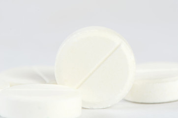 Tablets close up. A medical background