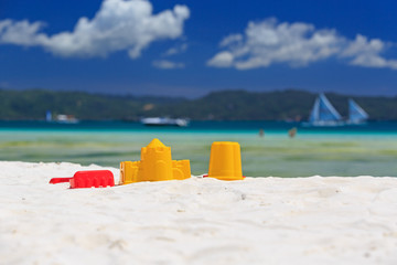 kids toys on sand beach