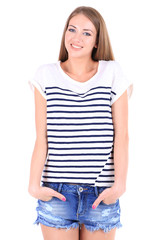 Obraz premium Beautiful young girl in shorts and t-shirt isolated on white