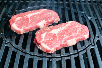 beef steaks on the grill
