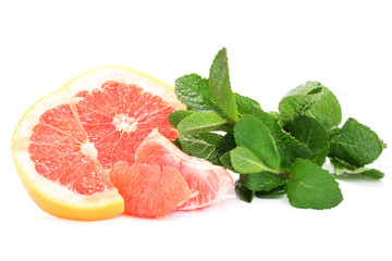 Grapefruit fruit with mint isolated on white