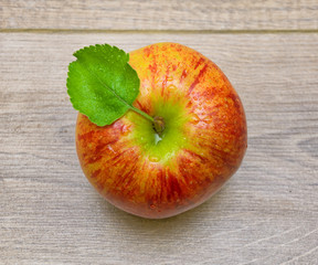 juicy apple closeup on wooden background