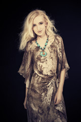 Nice young blonde girl posing in studio