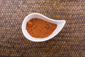 Cocoa powder for making drinks in a white ceramic