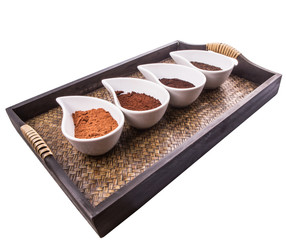 Cocoa powder, dried tea leaves and grounded coffee