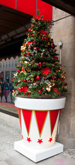 Fototapeta na wymiar Christmas tree out of shopping mall