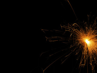 sparkling light on black background