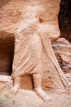 Destroyed figure with feet in the sig gorge to Petra