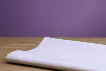 Background with wooden table and tablecloth