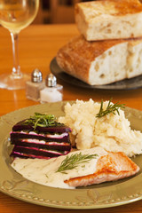 organic salmon in dill sauce with mashed potatoes,beets,wine
