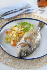 Baked sea bream with vegetables