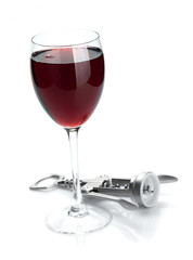 Red wine glass and corkscrew