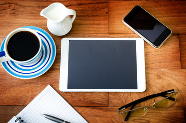 tablet pc and a coffee and Mobile phone