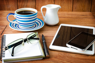 tablet pc and a coffee and Mobile phone
