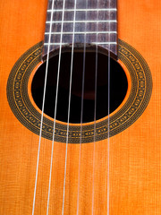 Obraz premium sound hole of spanish acoustic guitar close up