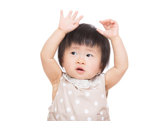 Asian baby girl two hands up