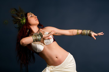 attractive retro model in old-fashioned wild clothing dancing