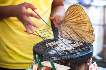 Fototapeta premium Grilled squid at Tai Fishing Village, Hong Kong