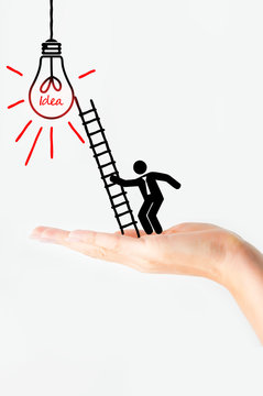 Businessman sketch climbing success ladder concept