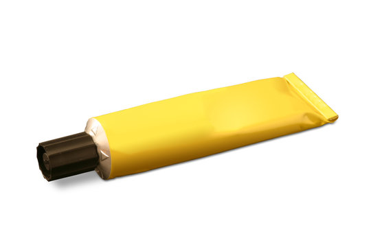 Gelbe Tube Klebstoff, freigestellt auf wei&szlig;em Hintergrund