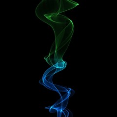 Blue and green smoke on black