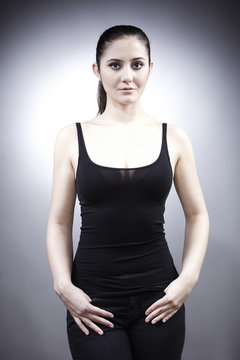 Black shirt beauty posing in studio
