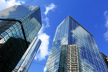 Fototapeta na wymiar Huge skyscraper with glass front in Hong Kong