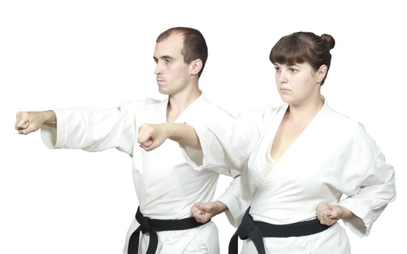 On white background two adults sportsmen are beating punch hand