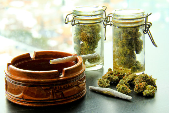 Marijuana Joints and Jars of Weed
