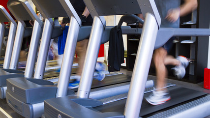 diverse equipment and machines at the gym room 