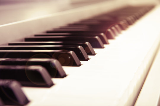 Selective focus of a piano keyboard keys retro style
