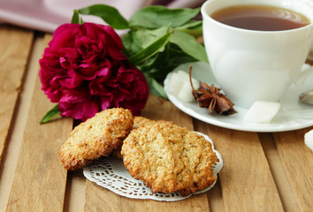 Homemade oatmeal cookies and a cup of tea.