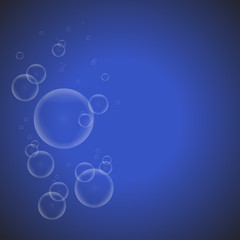 Soap bubbles on a blue background EPS10 vector